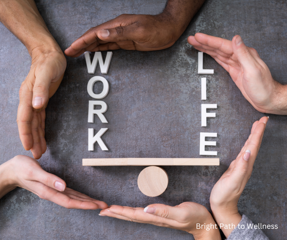 6 hands forming a circle, with "Work" written inside and "Life" on the other side, on top of a scale.