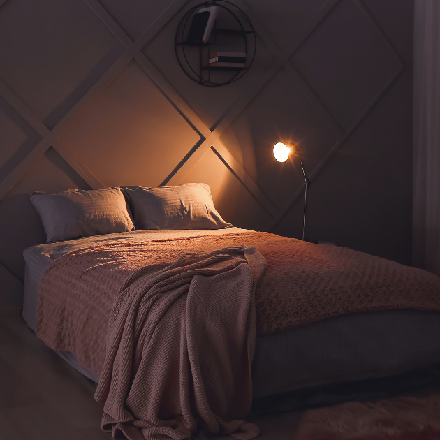 Sleep-optimized bedroom featuring soft lighting, temperature control, and calming decor.